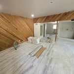 vynal flooring in living room kitchen area.
