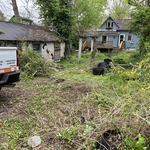 Before photo of the yard and garage