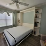 Queen Panel bed with Radius shelving on the right