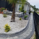 Flower beds rock and brick