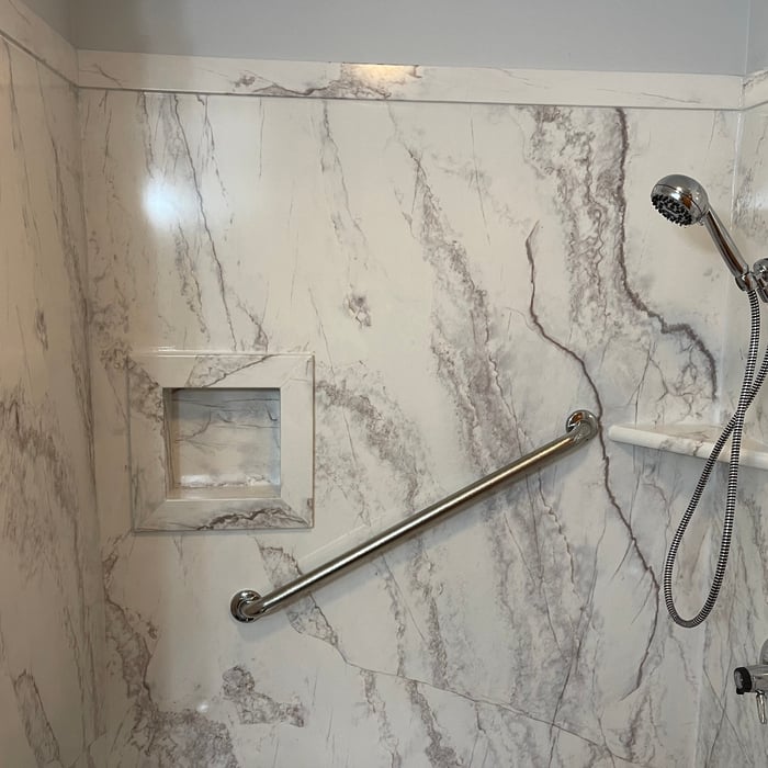 Tub to shower conversion