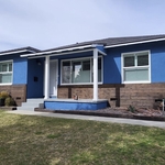 Exterior paint job completed on single story home.