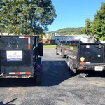 Wheeled dump trailers
