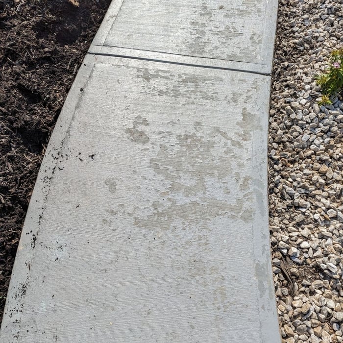 Pealing Epoxy on this beautiful Sidewalk