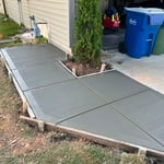 trash can pad with driveway extension