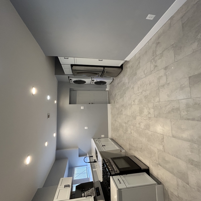 Tile cabinets paint trim appliance installed