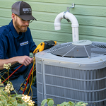 Tech working on HVAC unit