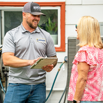 Tech talking with customer