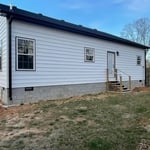 New 6” black gutters