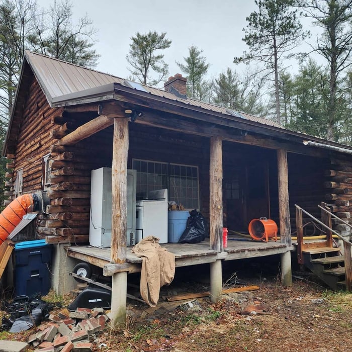 Log cabin out before