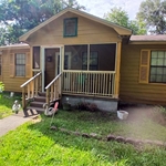 Screened front porch view