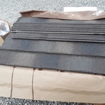 Looks just like asphalt shingles, but metal