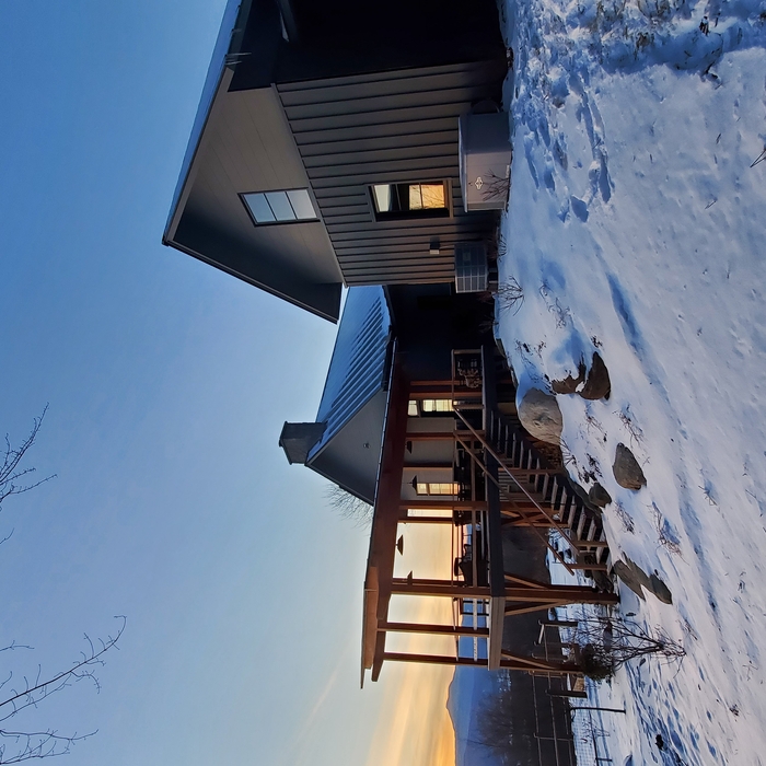 Rear Porch with custom siding detail