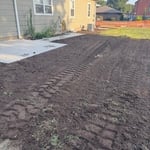 Top soil around sidewalk