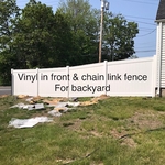 vinyl privacy fence in front and chain link fence