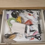 Disorganized breakroom drawer