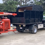 wood chipper and chip truck