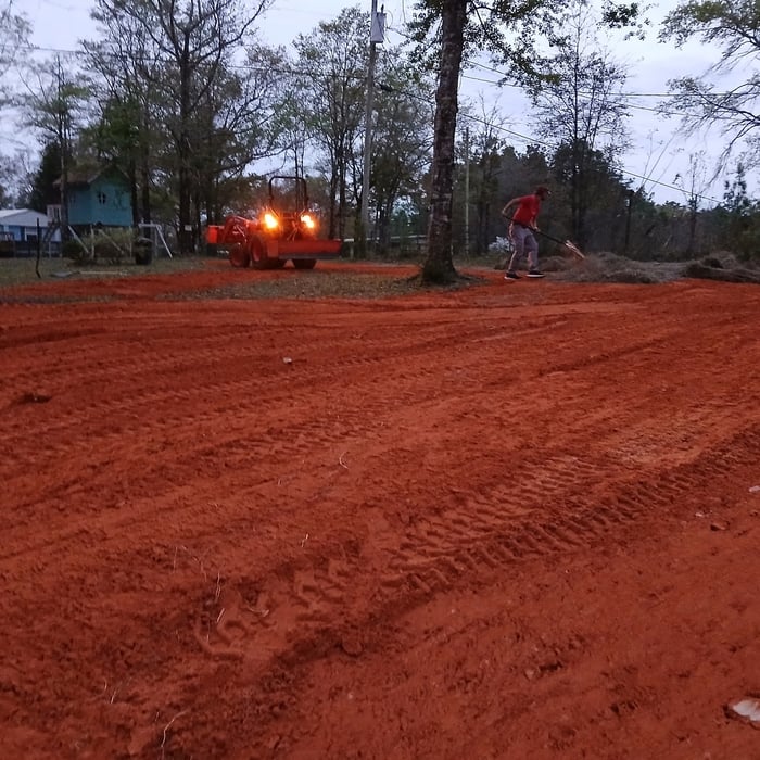 Dirt hauling and spread