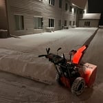 Cleaning sidewalks at a snow removal account
