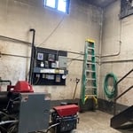 setting up camera in boiler room