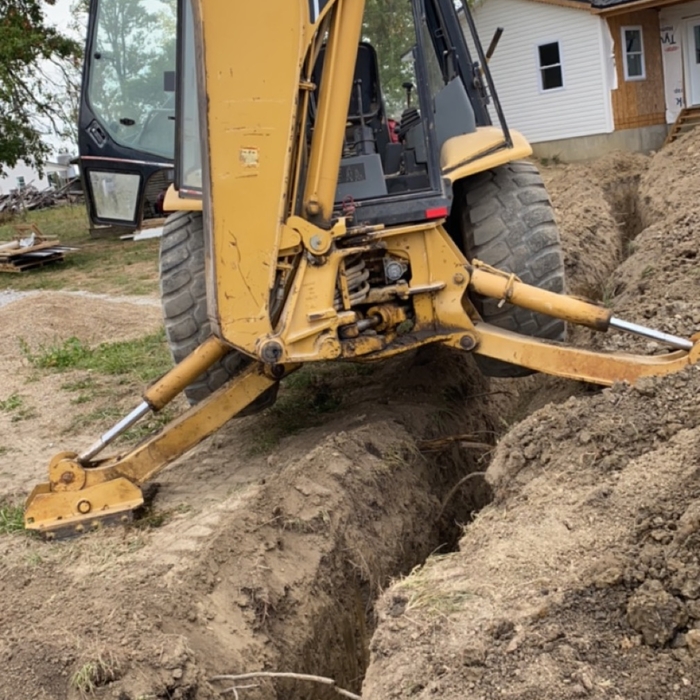basment drain pipe trench dug on grade