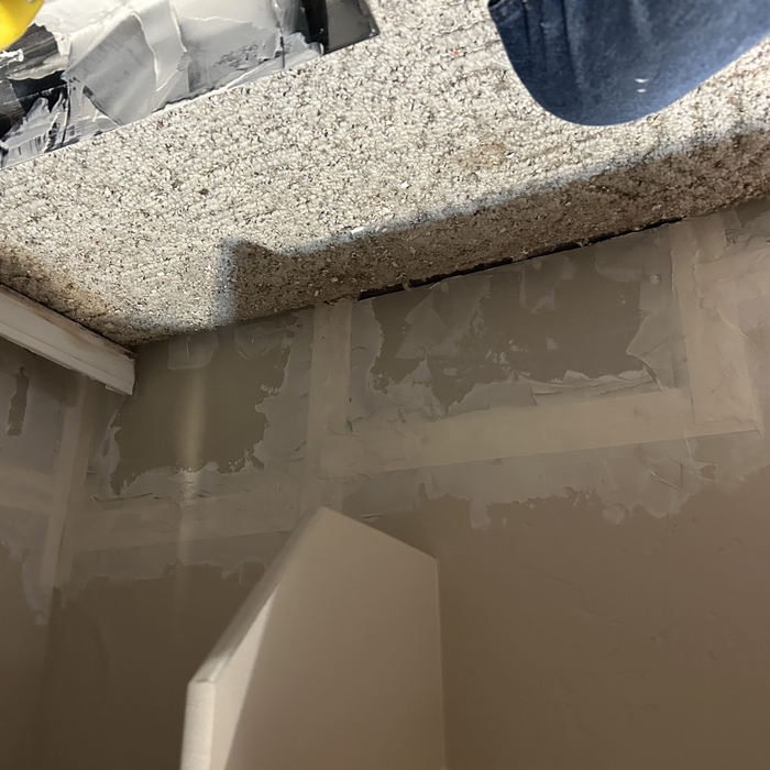 new sheetrock taped in