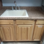 Replaced Cabinet, Countertop, Removed Black Mold