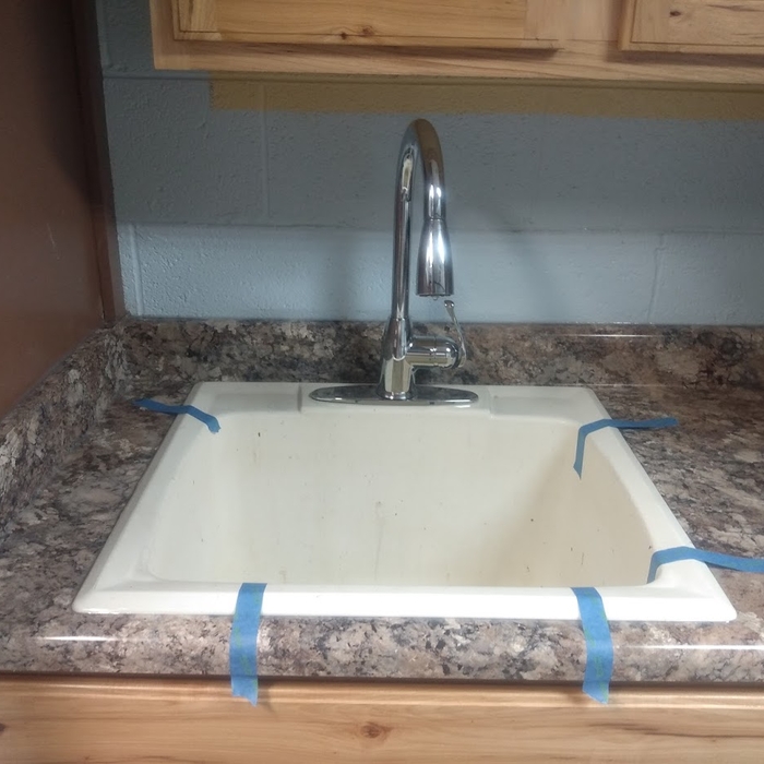 Replaced Cabinet, Countertop, Removed Black Mold