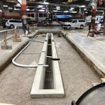Underground conduit for bus lift