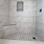 Calcutta Marbled Tile w/ Niche & Corner Bench