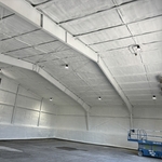 Spray Foam applied to walls and ceiling with a coating of intumescent paint