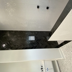 Elegant Black tile Herringbone installation