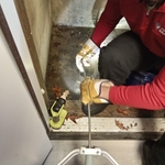 Safely cleaning stairwell storm drain
