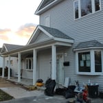 After Showing Added Second Floor and New Porch