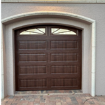 Garage door with top windows with design