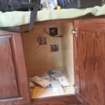 AV and Networking Within Cabinet next to fireplace