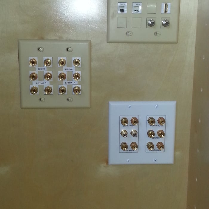 AV and Networking Within Cabinet next to fireplace