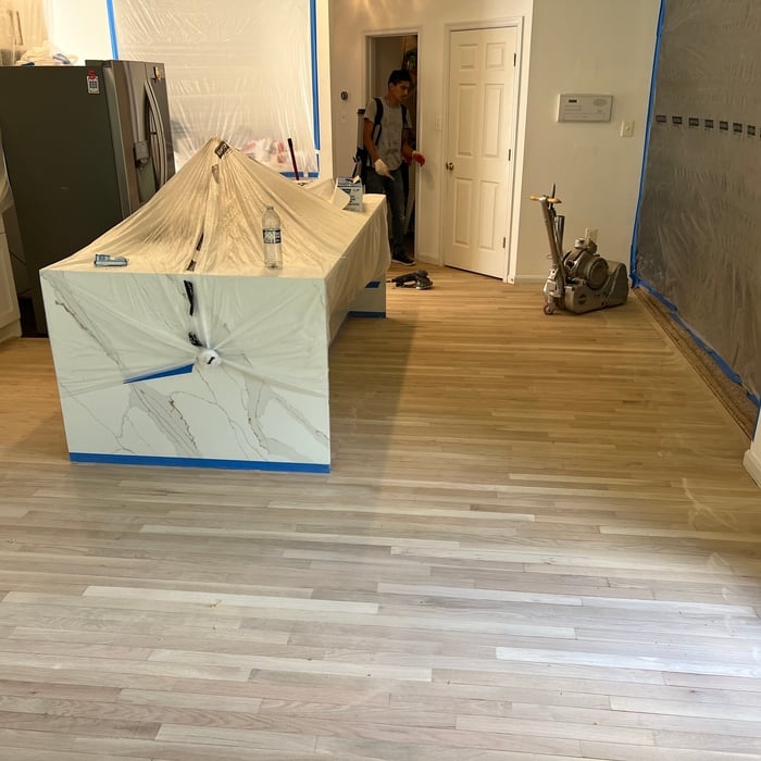 sanding the floor