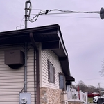 Replace service wire through the Mast pipe