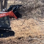 Removing brush to start pond
