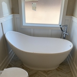 Updated soaking tub with floor mount tub valve