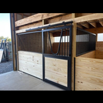 Horse stalls in barn