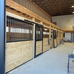 Horse stalls in barn