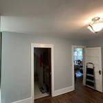 Repaired ceiling in bedroom after water leak.