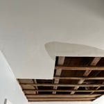 Sheetrock ceiling in downstairs bedroom needing repaired after water leak.