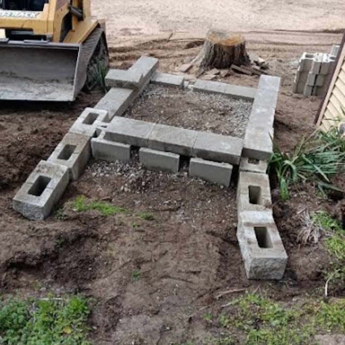 Foundation to the retaining wall