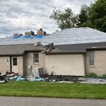 Side of house with new roofing