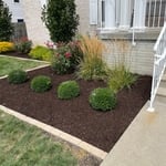 We've redone the entire mulch/flower bed
