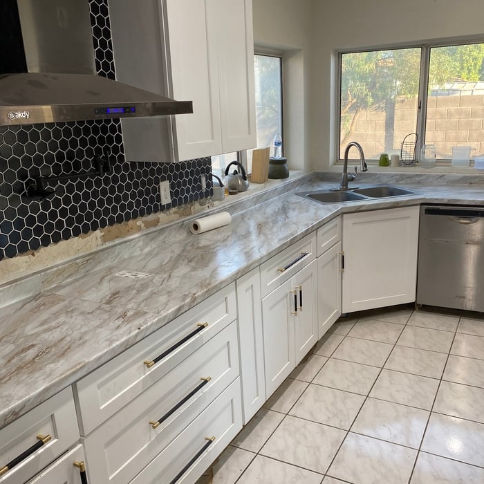 New cabinets and new countertop finishing