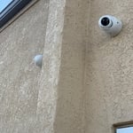 Camera with wire down wall